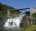 waterfall under a bridge
